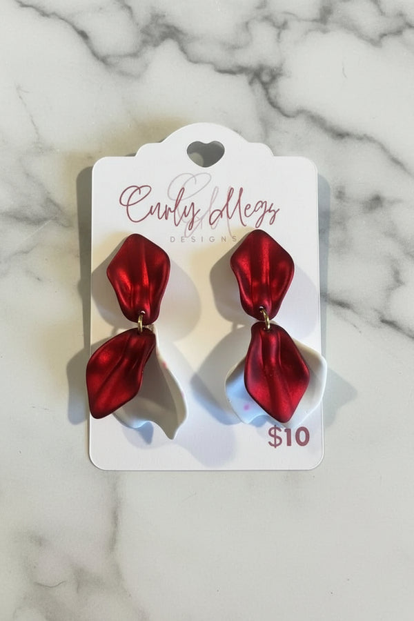 Curly Megs Designs red petal dangle earrings with a metallic sheen. Lightweight and romantic statement jewelry.
